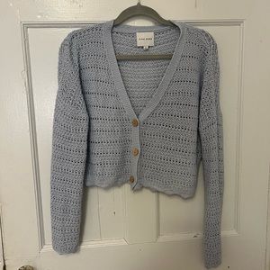 Blue v-neck knit sweater. Size small.